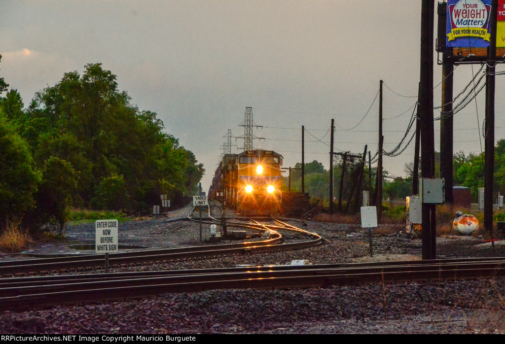 UP AC45CCTE locomotive leading a train in the Yard